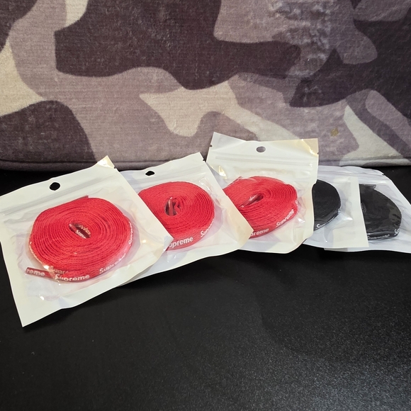 Supreme Red and Black Shoelaces with Supreme Stickers - Picture 2 of 5